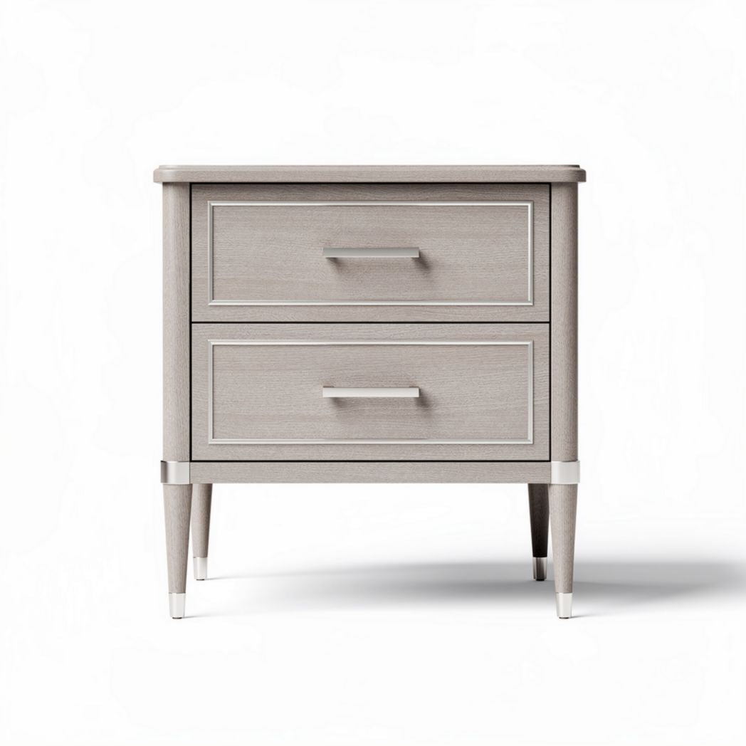 Gray three-drawer nightstand with rounded edges and metallic handles